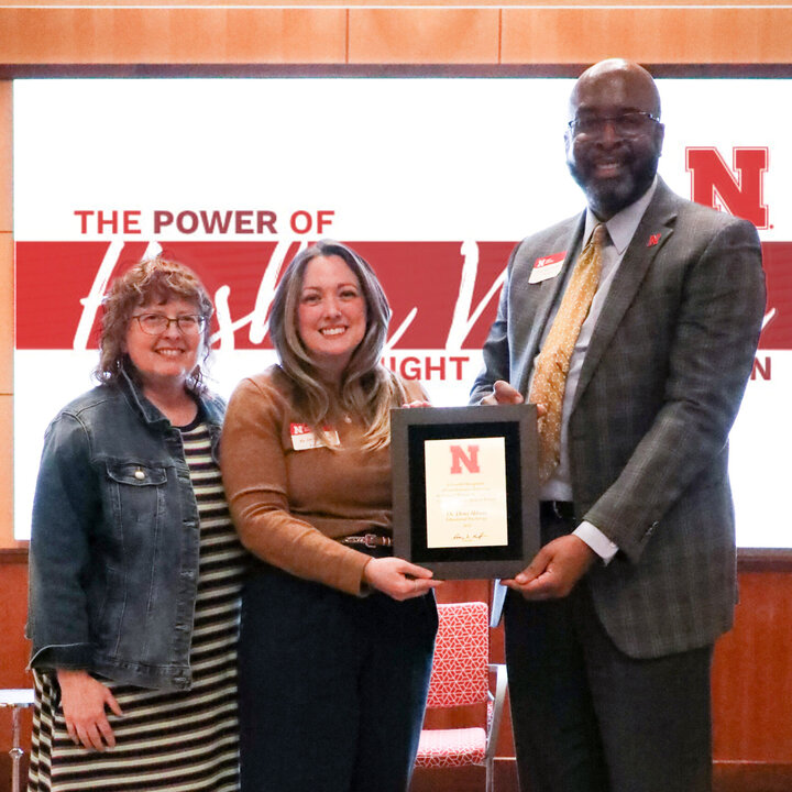 oann Ross Commission Chair, Dena Abbott the 2024 recipient of the Chancellor's Outstanding Contribution to Women Awards and Chancellor Rodney D. Bennett.